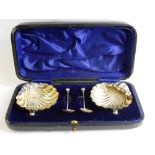 A Boxed Pair of Shell Form Solid Silver Salts, Chester hallmark, dd 1895, mm James Deakin & Sons,