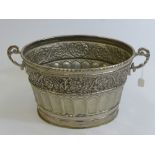 A Silver Metal Twin Handled Champagne Bucket.