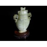 Chinese 20th Century Pale Celadon Jade Vase and Cover. The vase carved with Taotie in shallow relief