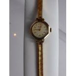 A Lady's 9 ct Gold Bentina Cocktail Watch, the watch on a Brevet bracelet.