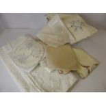 A Quantity of  Vintage Lace and Embroidered Linen, including table cloths, tray cloths and napkins.