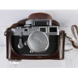 A Leica M3 Rangefinder Camera, Serial No 73345 dated 1955, fitted with a Summicron f=5 cm 1:2 Lens &