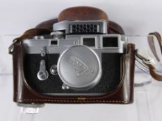 A Leica M3 Rangefinder Camera, Serial No 73345 dated 1955, fitted with a Summicron f=5 cm 1:2 Lens &
