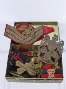 A Collection of Original Royal Artillery Military Insignia, including a Victorian helmet plate.