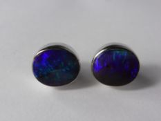 A Pair of 18 Ct White Gold and Black Opal Earrings, opals approx 11 x 9 mm, approx 3.8 gms.