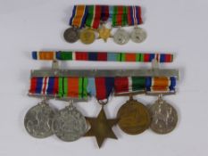 A Group of Seven Miniature Medals, including 1939 - 45, Africa, Burma Stars, Defence Medal, India