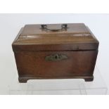 Two Stationery Boxes, one rosewood the other oak together with an Oak Tea Caddy.