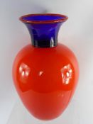 Two Decorative Studio Glass Vases, red baluster design with cobalt blue neck.