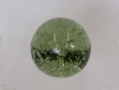 A Large Green Victorian Dumper Weight, with bubble inclusions.