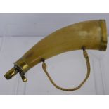 A Continental Horn Powder Flask, with embroidered fabric handle and brass mounts.