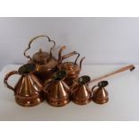A Collection of Miscellaneous Copper, including two kettles, four graduated jugs, stew pot ladle.