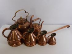 A Collection of Miscellaneous Copper, including two kettles, four graduated jugs, stew pot ladle.