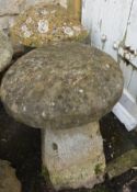 A Pair of Antique Saddle Stones, approx 70 cms tall.