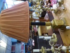 A Gilt Brass Lamp Base in the French Empire style, with reeded column supported on a square plinth