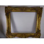 An Ornate Wood and Plaster Picture Frame, approx 62 x 82 cms.