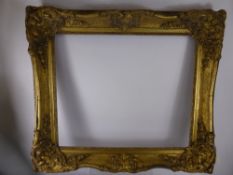 An Ornate Wood and Plaster Picture Frame, approx 62 x 82 cms.