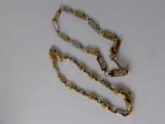 Two Lady's 750 Yellow and White Gold Bracelets, together with a fine chain approx wt 7.5 gms. (3)