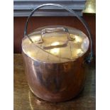 A Fireside Copper Cooking Pot and Lid.