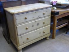 A Pine Chest of Drawers, with three drawers on bun feet, approx 100 x 95 cms