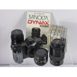 A Minolta Dinax 7000 i No. 16323609 Camera, with instruction manual and custom sling strap,