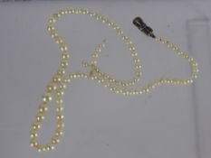 An Antique Graduated Cultured Pearl Necklace, approx 39 cms long, pearls ranging from 1.5 to 12 mm