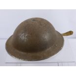 A Vintage WWI French Helmet.