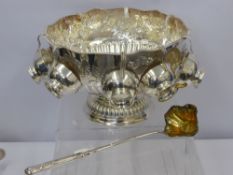 A Silver Plated Punch Bowl, embossed with floral design, lion mask handles with fluted bowl and