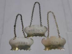 Three Silver Liquor Labels, Sheffield hallmark dd 1977, mm F.S. including Gin, Whisky and Sherry,