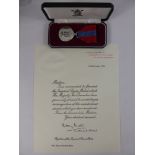 An Imperial Silver Service Medal to Miss Mary Elizabeth Blake, together with certificate on "Central