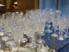 A Collection of Waterford Cut Glass, including six sherry, six white wine and three red, with