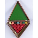 Burroughs & Watts Antique Snooker Balls and Case, together with a John Bennett & Co., billiard score