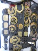 A Quantity of Horse Brasses, six leathers with horse brasses, circa 1940's, approx 16 in total.
