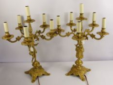 A Pair of Brass Italian LeRelco Candelabra Lamps, the five branch lamp decorated in the Rococo