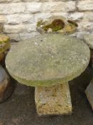 A Pair of Antique Saddle Stones, approx 70 cms tall.