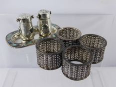 Four Silver (Mexican) Napkin Rings, together with an abalone cruet, comprising salt, pepper and