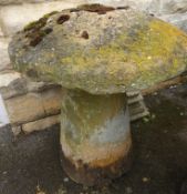 A Single Circular Antique Saddle Stone, approx 117 X 70 cms tall.