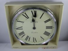 A Contemporary Battery Operated Wall Clock, Roman dial, approx 75 x 70 cms