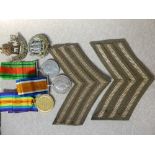 WWI and WWII Boxed Medals to Sgt C. Jacob, Northamptonshire Regiment, with badges and original paper