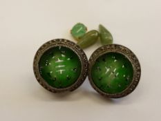 A Pair of Antique Chinese Apple Green Jade Earrings, the disc form earrings depicting Chinese