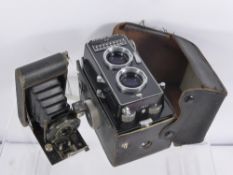 A Vintage Ritoh Auto 66 Camera and Case, together with a Kodak pocket camera no. 127. (2)