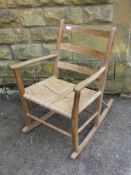 A Shaker Style Kitchen Rocker, with rush seating.