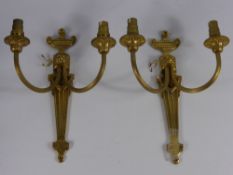 Ten Brass Double Wall Sconces in the classical style.
