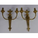 Ten Brass Double Wall Sconces in the classical style.