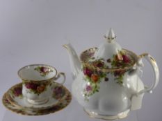 A Part Royal Albert 'Old Country Roses' Tea Set, comprising large tea pot, small tea pot, milk