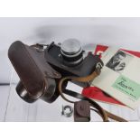 A Vintage Leica (Ernst Leitz Wetzler) Camera, no. 764804 dd 1965 with the original Leica camera