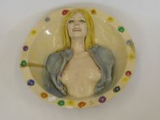 A Large Ceramic Wall Plate, depicting a young woman, signature and date 1976 to verso.