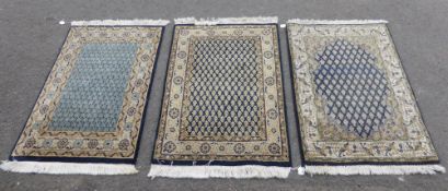 Three Miiddle Eastern Style Woollen Rugs, all approx 92 x 63 cms.