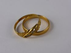 A 22 Ct Yellow Gold Wedding Ring, size O approx 2.9 gms together with an 18 ct yellow gold wedding