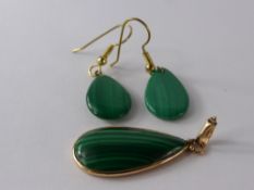 A Lady's Yellow Gold Almond Form Malachite Pendant together with a pair of yellow metal and