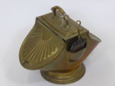 A Regency Style Double Coal Bucket, together with fire irons and a brass fire surround.